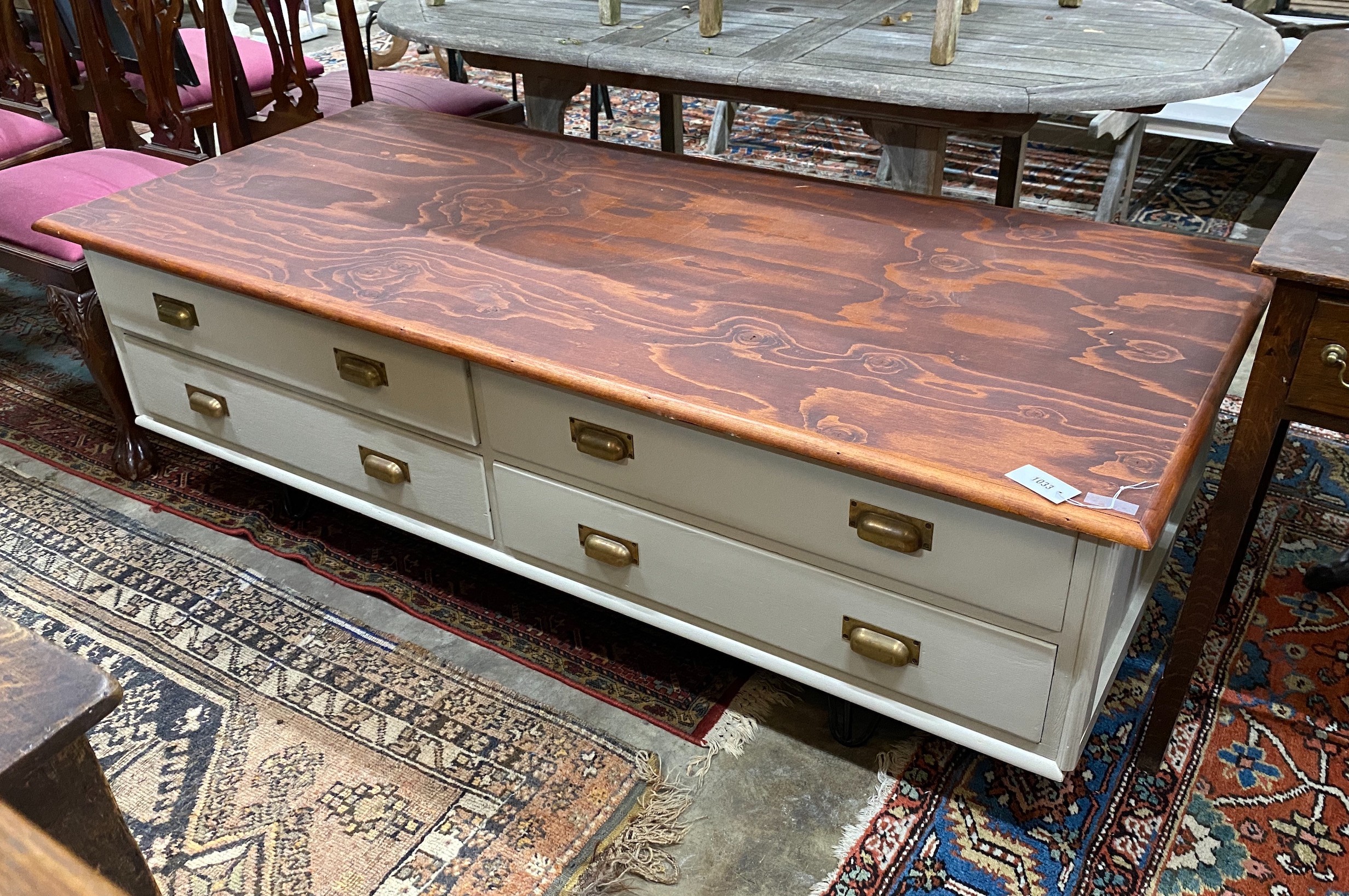 A large modern painted four drawer coffee table on wrought iron feet, length 180cm, depth 80cm, height 55cm